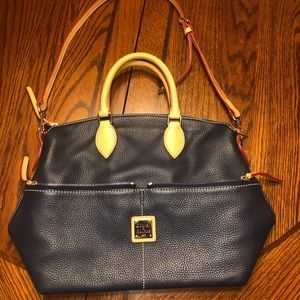 A blue, tan, and red Dooney & Bourke 1975 Purse!